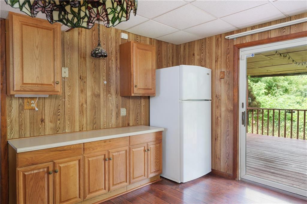 118 Klein Road Clairton, PA 15025 - Photo 27 of 39 a white refrigerator freezer sitting inside of a kitchen