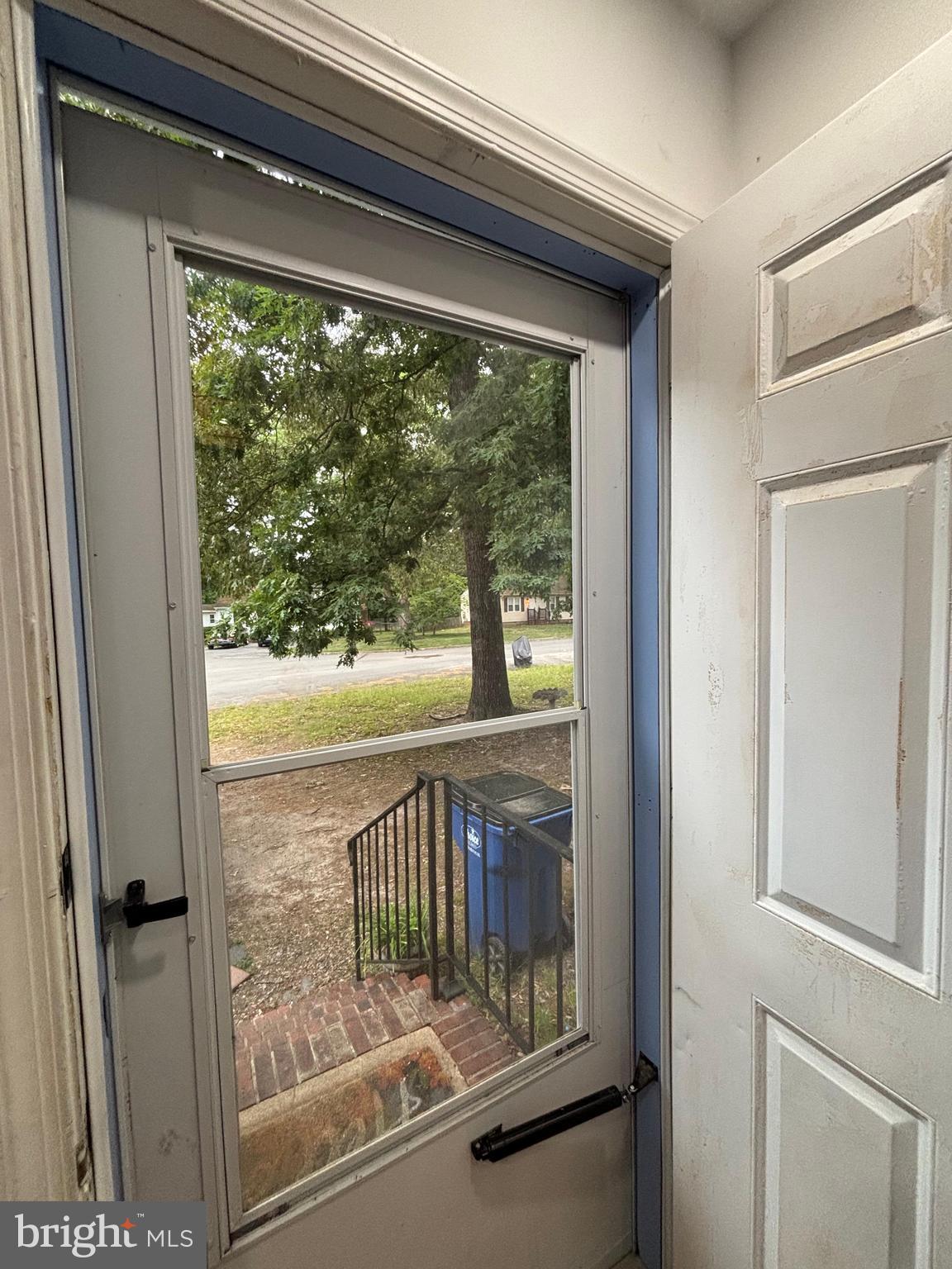6004 Simplicity Court Chesterfield, VA 23832 - Photo 2 of 17 a view of a porch with a door and wooden floor