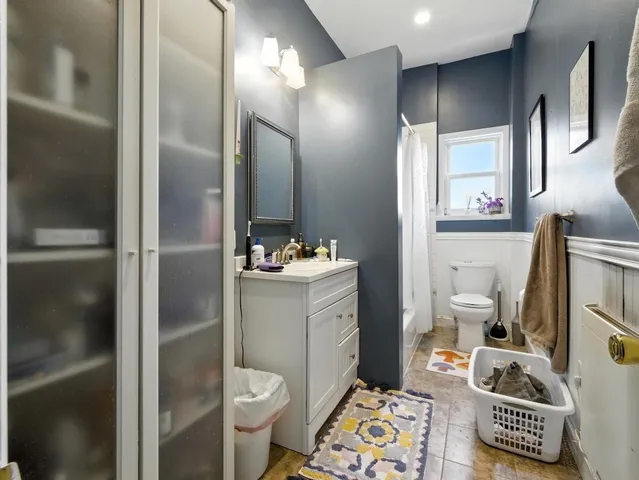 a living room with furniture or couch and a window