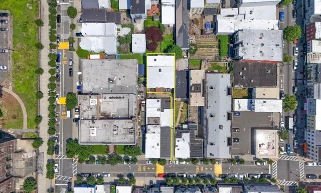 an aerial view of a city with lots of residential buildings