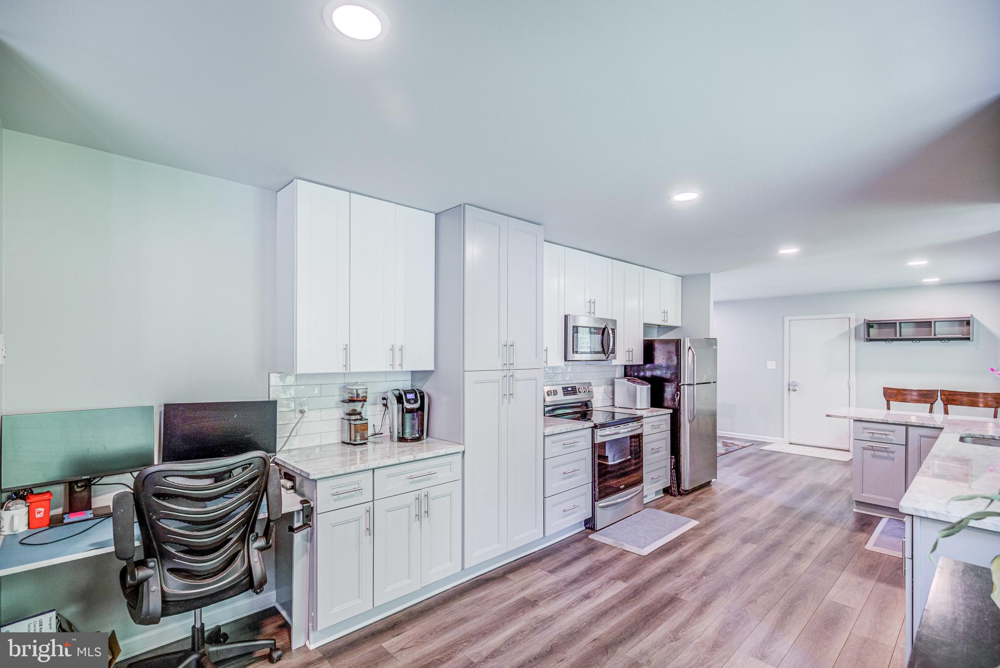 7307 Reservation Drive Springfield, VA 22153 - Photo 22 of 47 Built in desk and pantry cabinetry