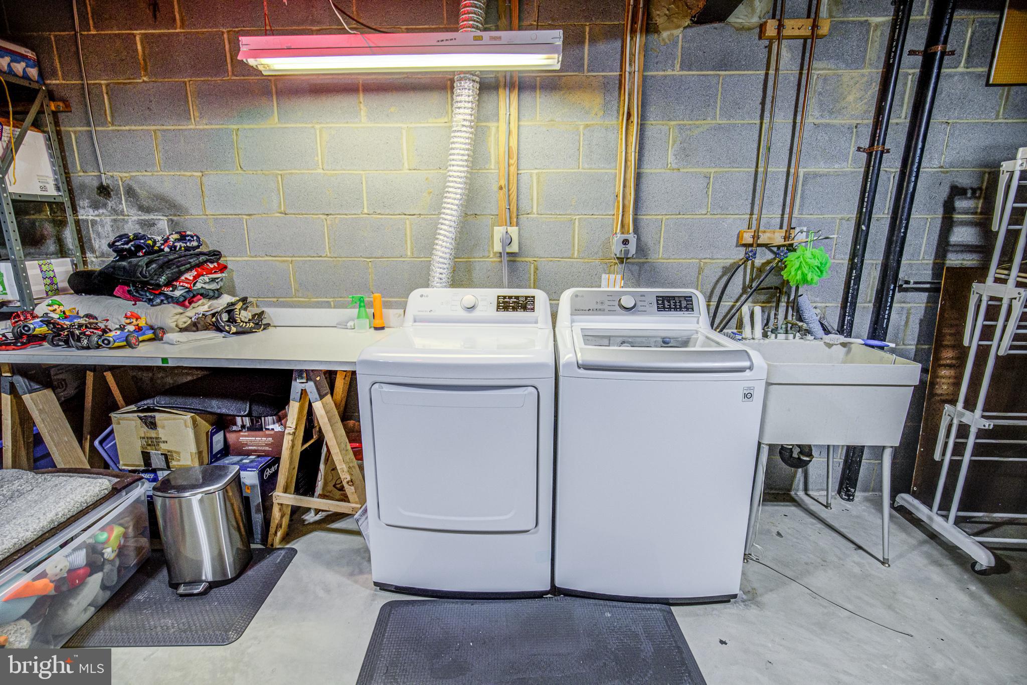 7307 Reservation Drive Springfield, VA 22153 - Photo 43 of 47 Newer washer and dryer, laundry chute nearby