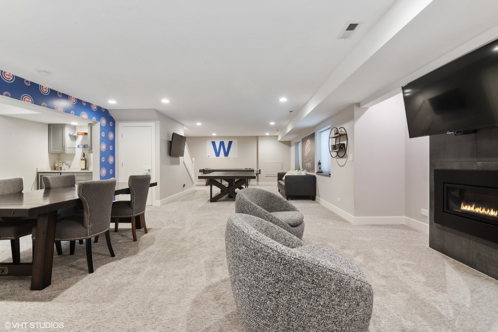 933 Echo Lane Glenview, IL 60025 - Photo 23 of 28 a living room with furniture and a flat screen tv