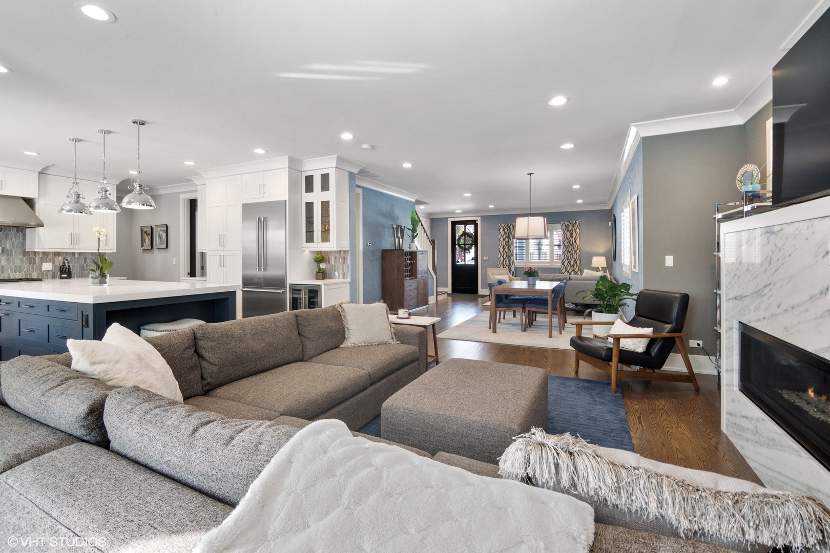 933 Echo Lane Glenview, IL 60025 - Photo 8 of 28 a living room with furniture and a fireplace