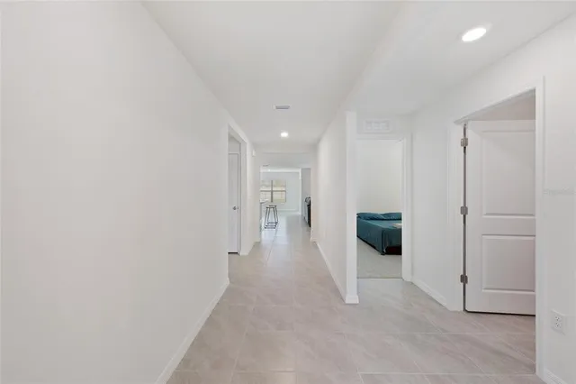 a view of a hallway with a furniture