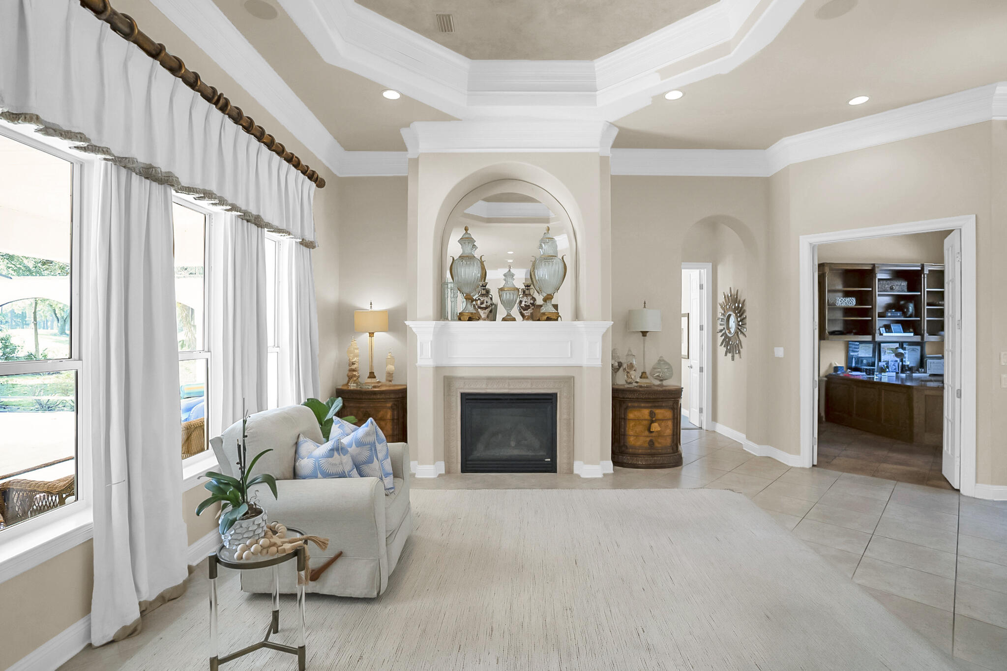 4372 Stonebridge Road Destin, FL 32541 - Photo 12 of 83 a living room with furniture and a fireplace