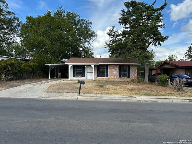 front view of house with a yard