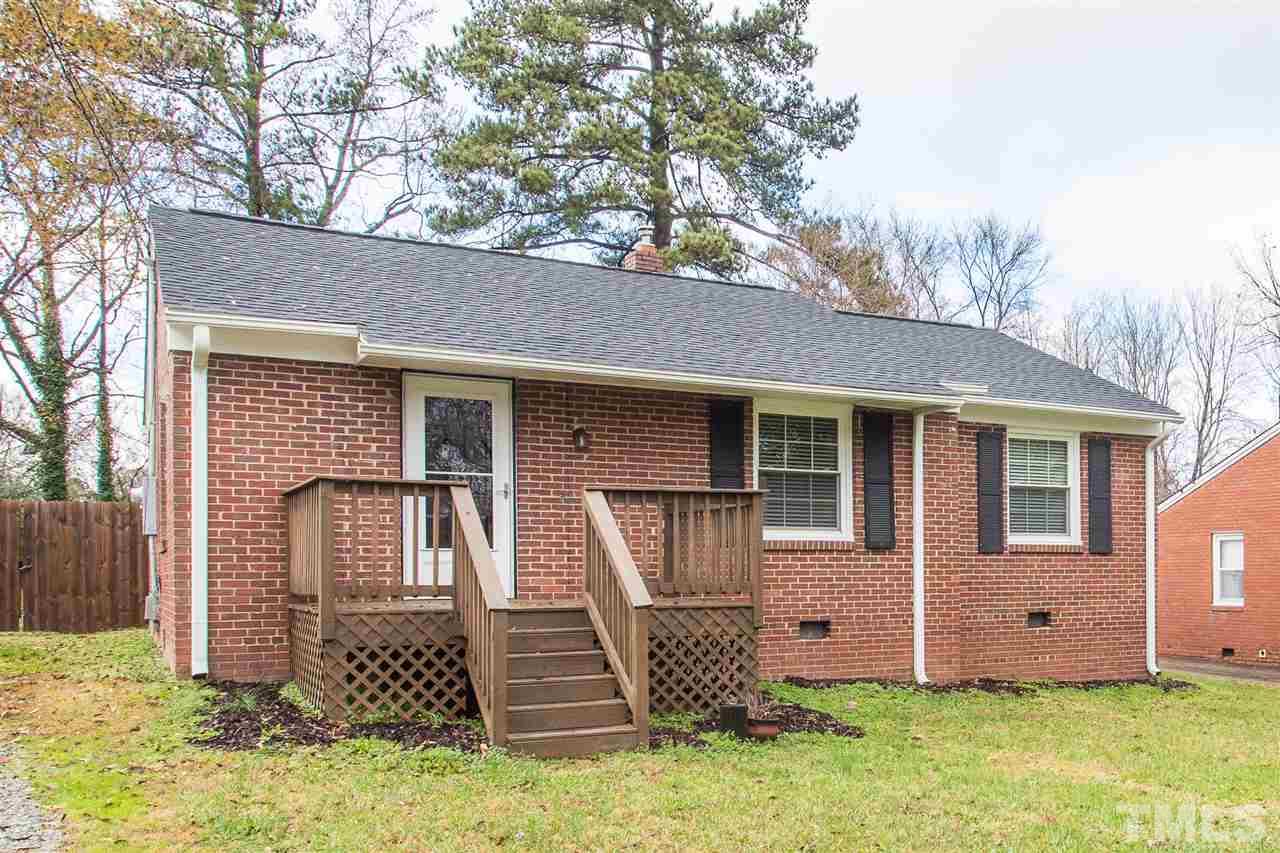 2732 Knowles Street Raleigh, NC 27603 - Photo 1 of 26 a front view of a house with garden