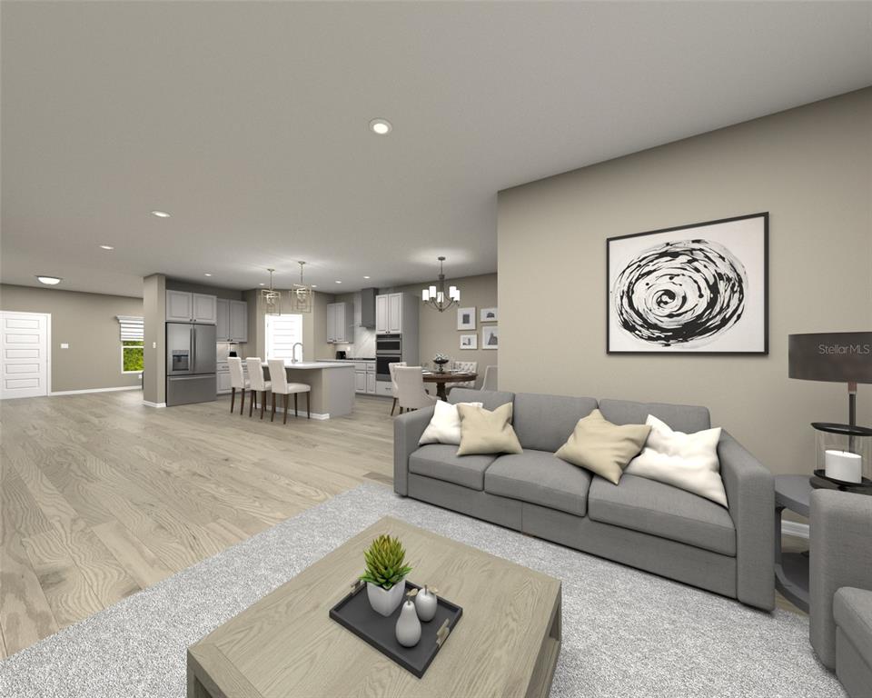 148 Shady Edge Loop Nokomis, FL 34275 - Photo 3 of 5 a living room with furniture and wooden floor