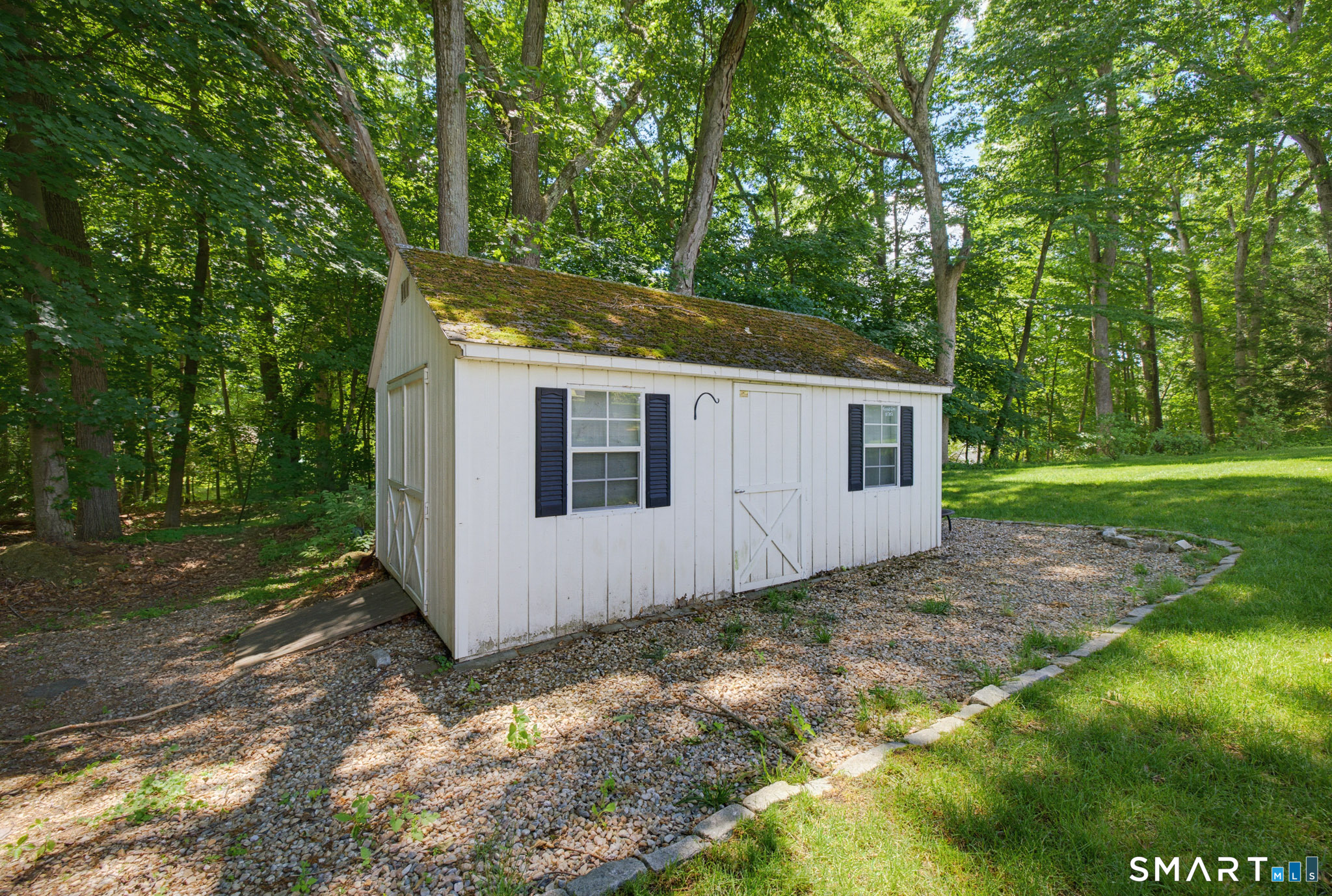 224 Spring Street Manchester, CT 06040 - Photo 35 of 39 a view of a house with a yard