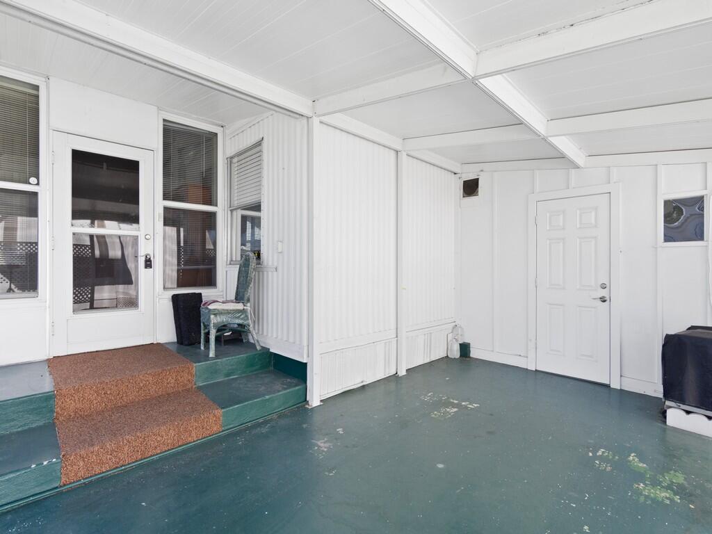 4800 Southeast Federal Highway, Unit 93 Stuart, FL 34997 - Photo 6 of 25 a view of an empty room with a window