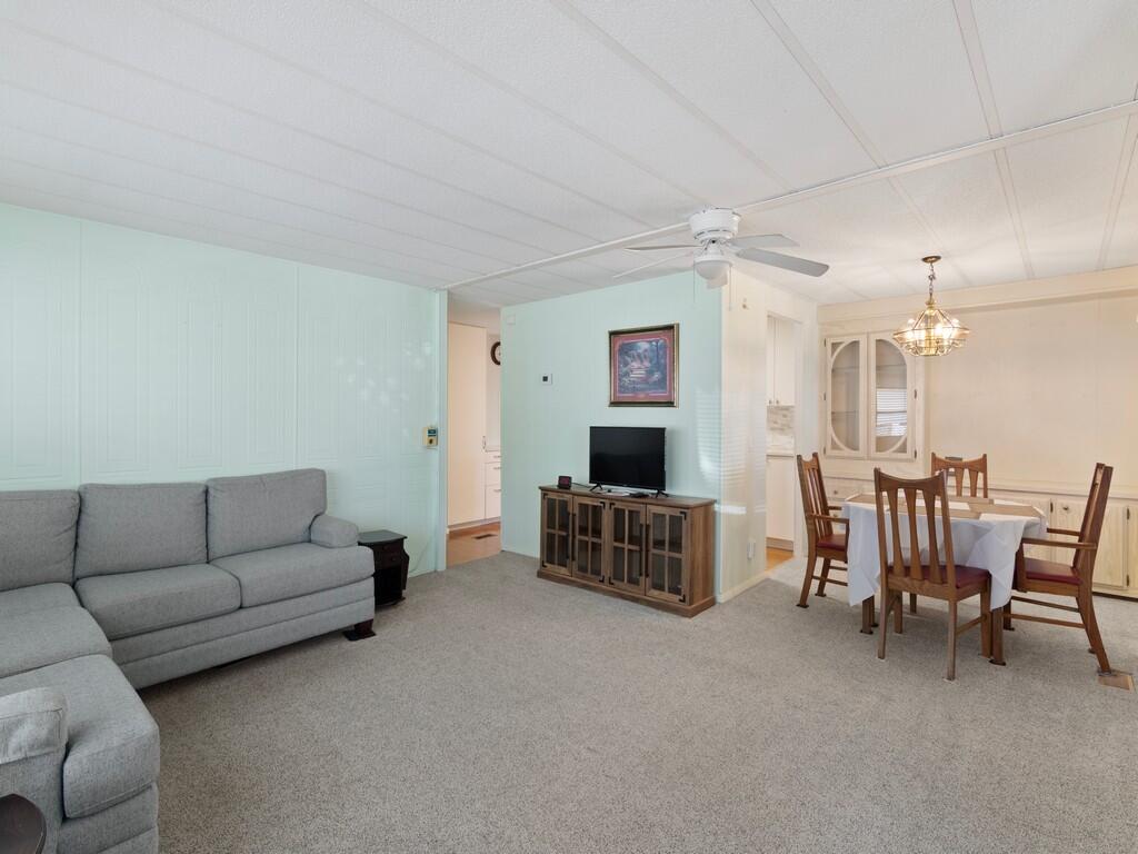 4800 Southeast Federal Highway, Unit 93 Stuart, FL 34997 - Photo 9 of 25 a living room with furniture