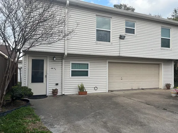 a view of a house with a garage