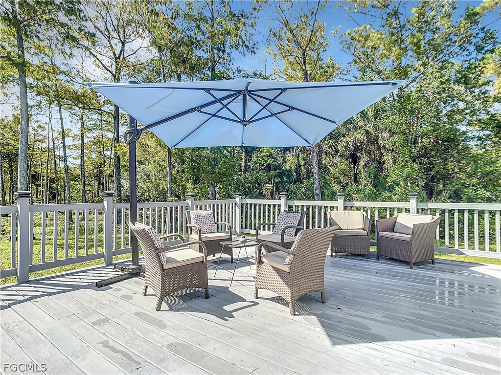 2511 6th Street Northwest Naples, FL 34120 - Photo 35 of 39 a view of roof deck with furniture