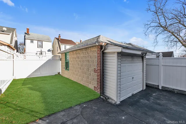 a view of storage and utility room with washer and dryer