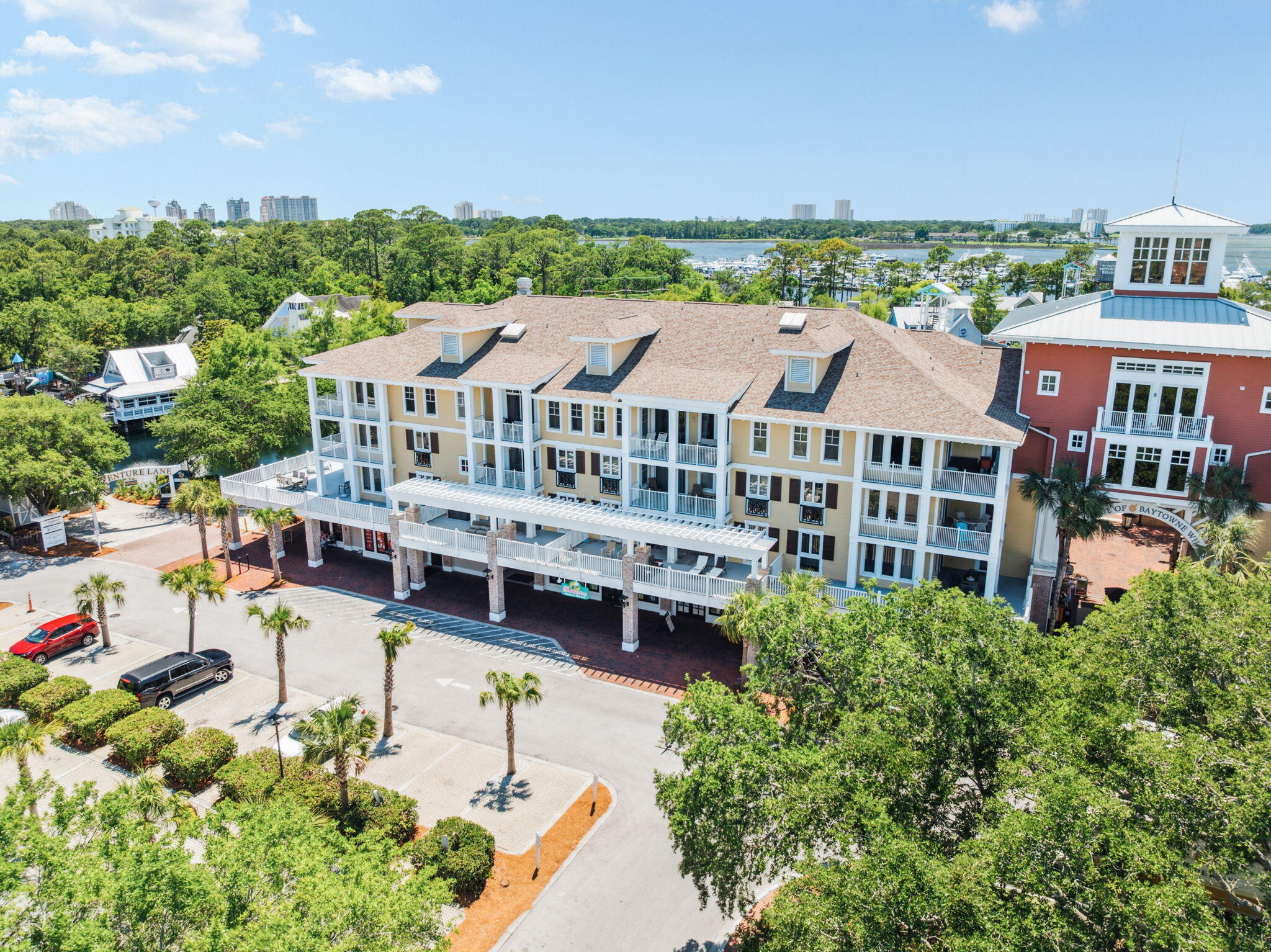 9100 Baytowne Wharf Boulevard, Unit 3668 Miramar Beach, FL 32550 - Photo 1 of 38 an aerial view of multiple houses with a yard