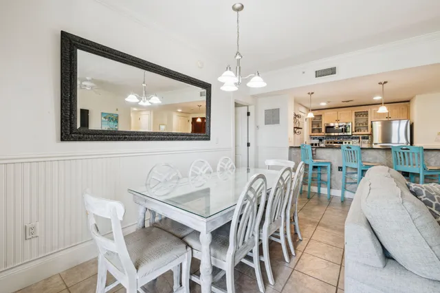 a view of a dining room and livingroom with furniture
