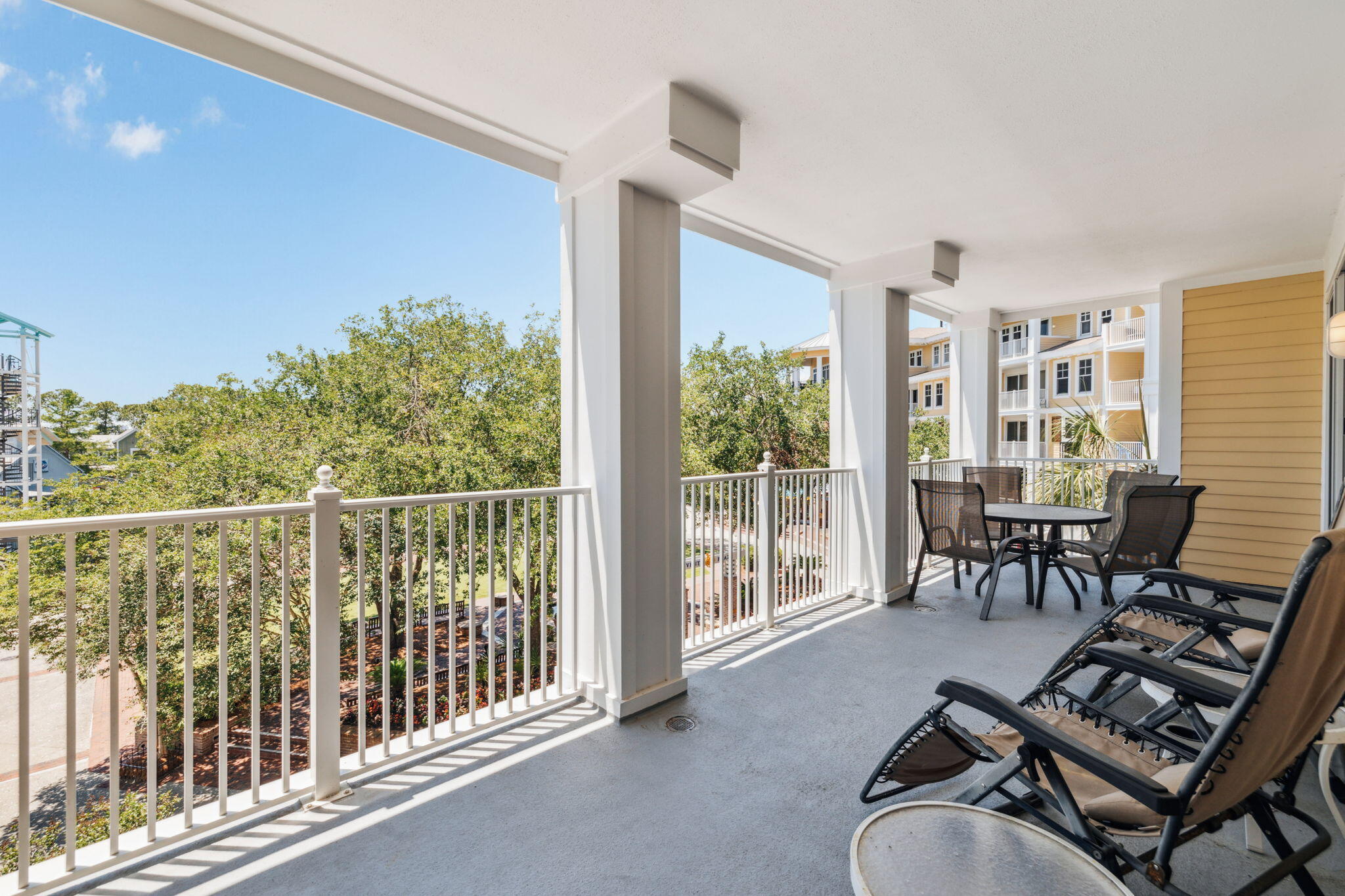 9100 Baytowne Wharf Boulevard, Unit 3668 Miramar Beach, FL 32550 - Photo 16 of 38 a living room with furniture and a floor to ceiling window