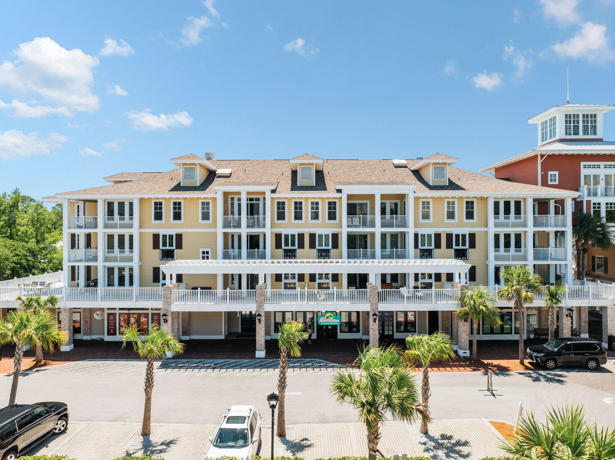 9100 Baytowne Wharf Boulevard, Unit 3668 Miramar Beach, FL 32550 - Photo 2 of 38 a front view of a building with street view and sitting space