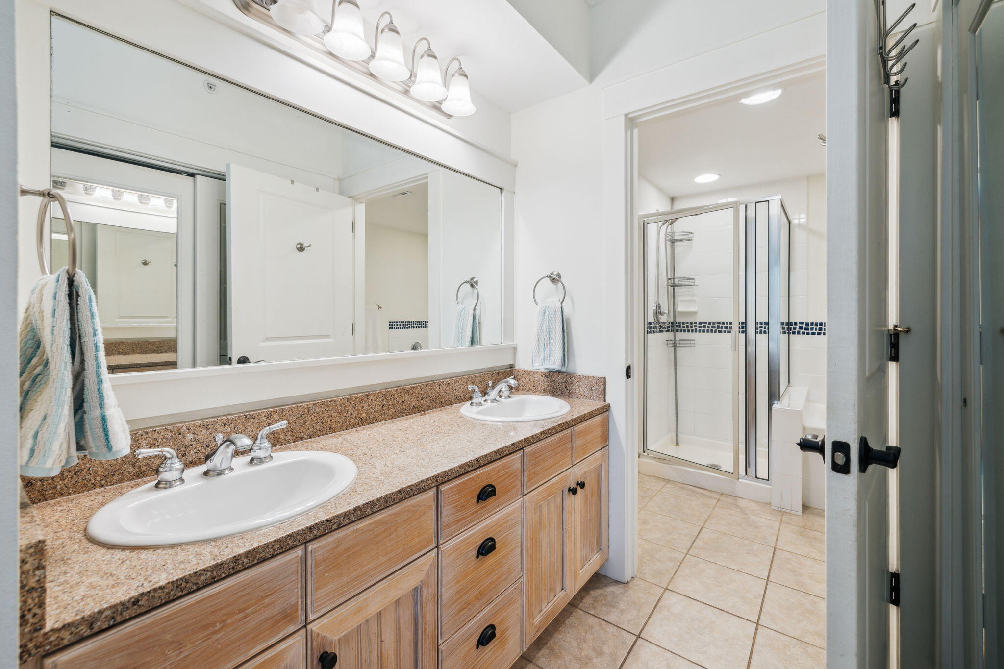 9100 Baytowne Wharf Boulevard, Unit 3668 Miramar Beach, FL 32550 - Photo 21 of 38 a bathroom with a sink double vanity and a mirror