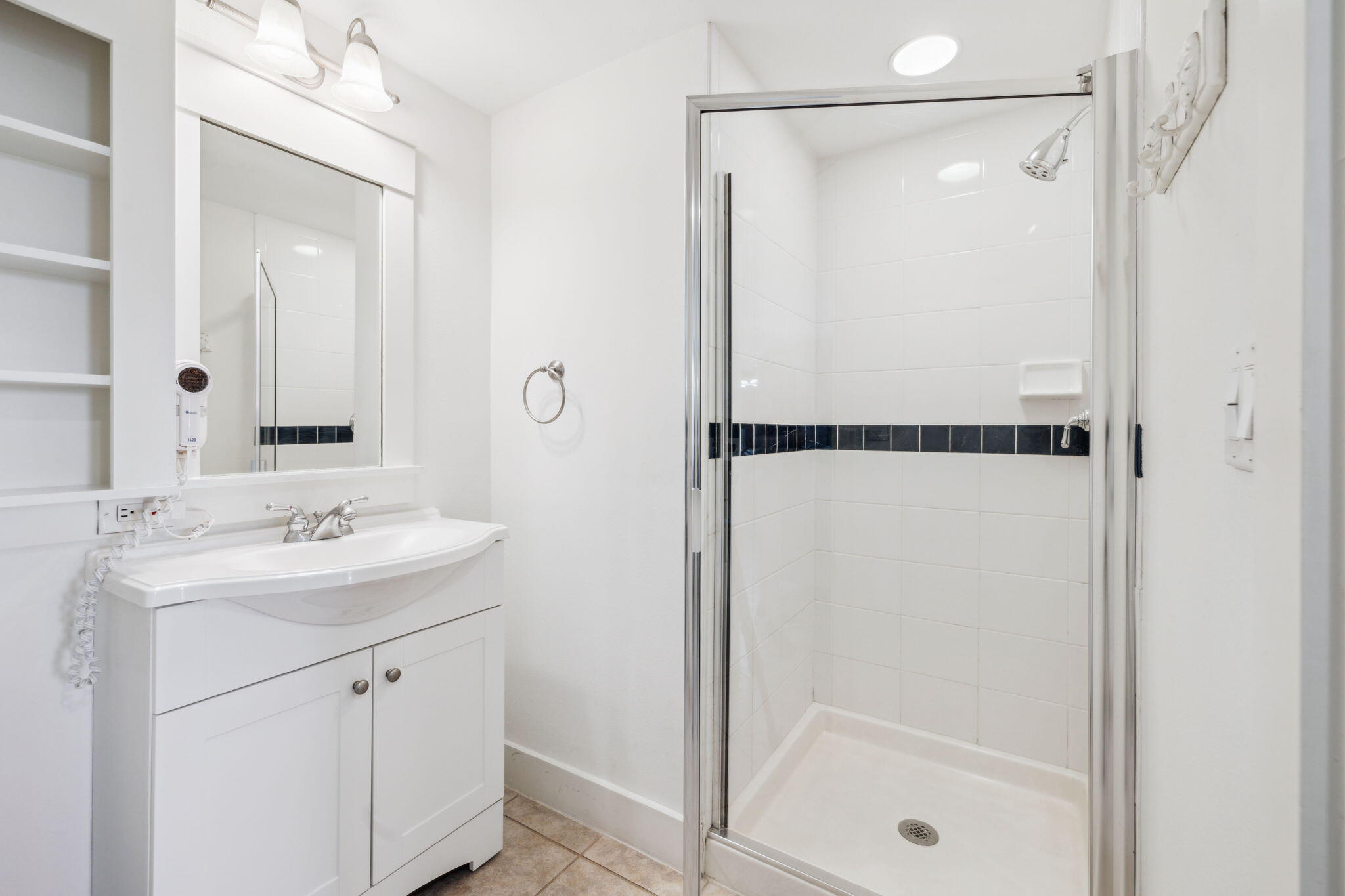 9100 Baytowne Wharf Boulevard, Unit 3668 Miramar Beach, FL 32550 - Photo 25 of 38 a bathroom with a shower sink and mirror