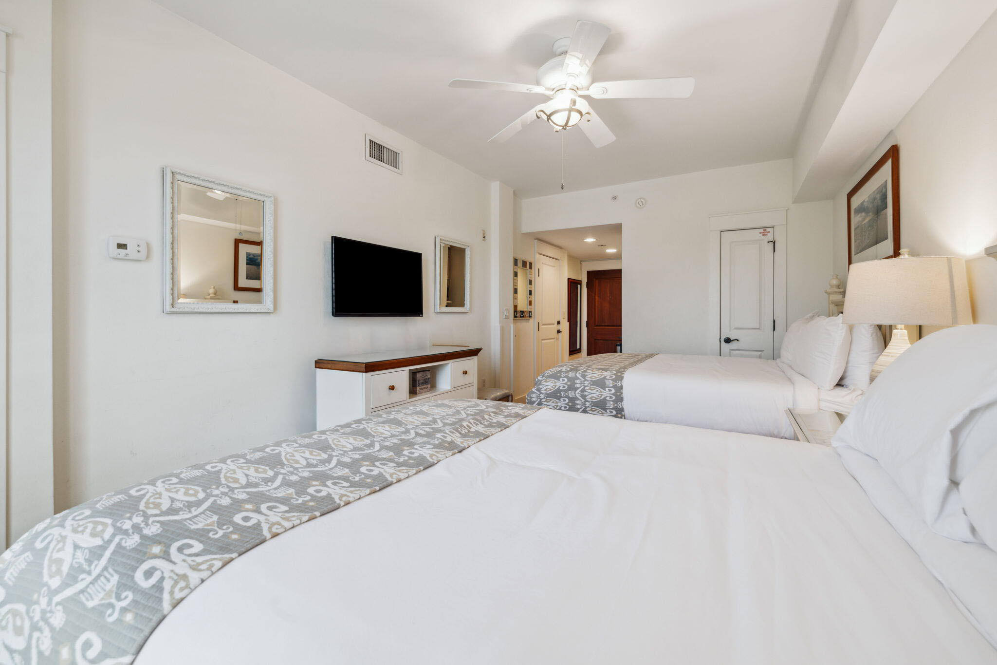 9100 Baytowne Wharf Boulevard, Unit 3668 Miramar Beach, FL 32550 - Photo 28 of 38 a bedroom with a bed and a flat screen tv