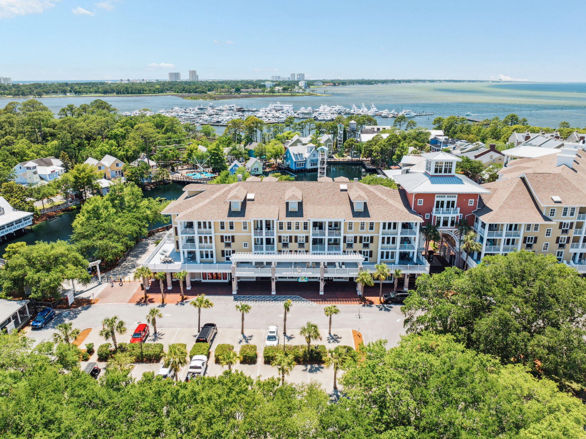 9100 Baytowne Wharf Boulevard, Unit 3668 Miramar Beach, FL 32550 - Photo 36 of 38 a view of a house with outdoor space and a lake view in back