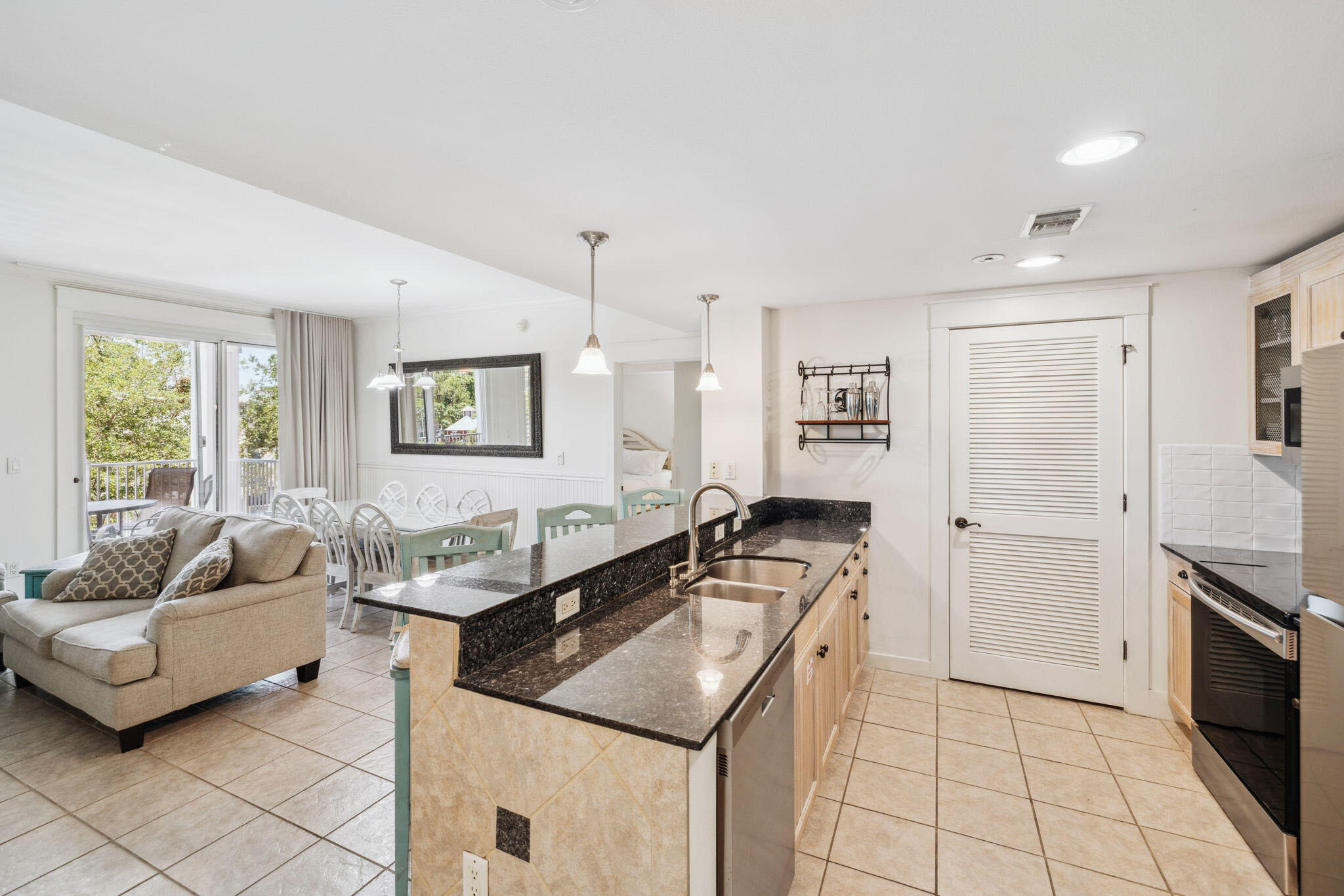 9100 Baytowne Wharf Boulevard, Unit 3668 Miramar Beach, FL 32550 - Photo 5 of 38 a living room with furniture and a flat screen tv
