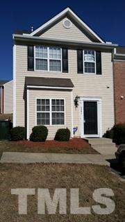 3361 Bridgeville Road, Unit 71 Raleigh, NC 27610 - Photo 1 of 3 a front view of a house with yard and parking space