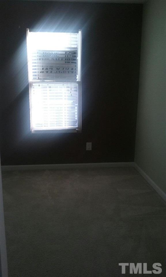 3361 Bridgeville Road, Unit 71 Raleigh, NC 27610 - Photo 3 of 3 a view of an empty room with a window