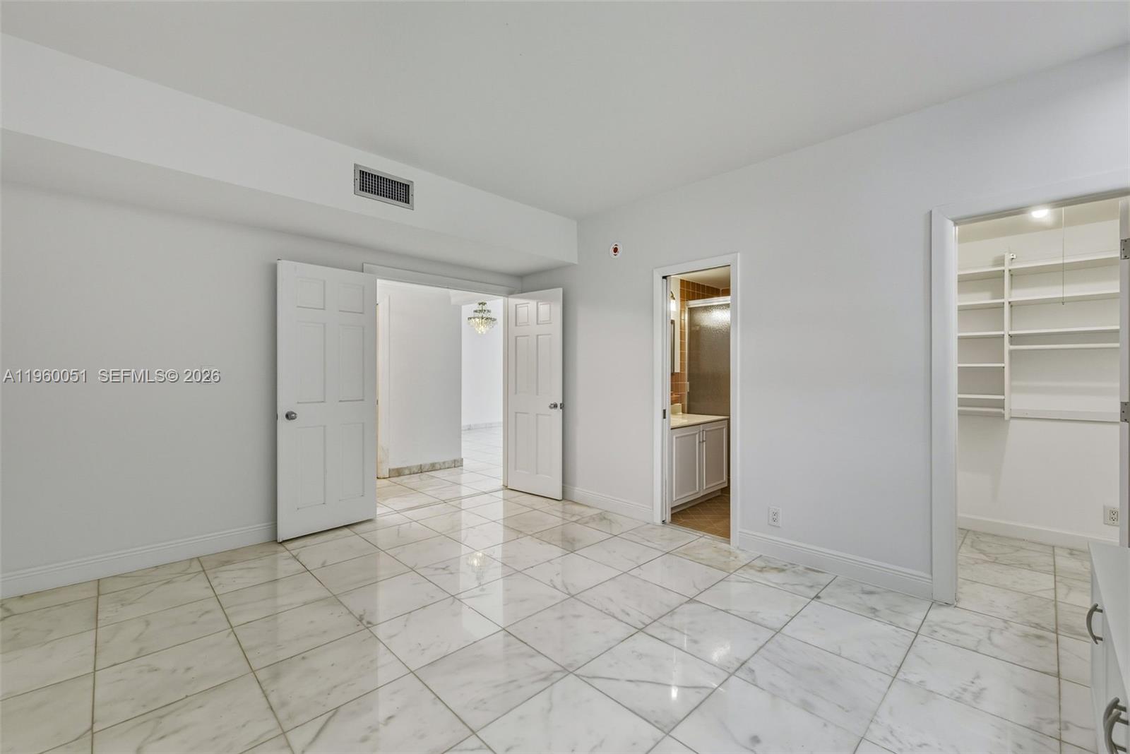 1 Harbour Way, Unit 108 Bal Harbour, FL 33154 - Photo 15 of 27 a view of an empty room and window