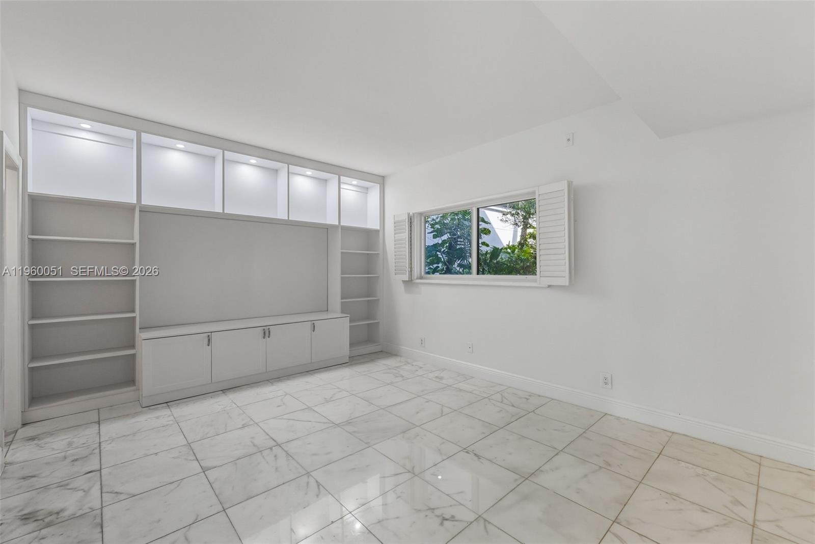 1 Harbour Way, Unit 108 Bal Harbour, FL 33154 - Photo 16 of 27 a view of an empty room with a window
