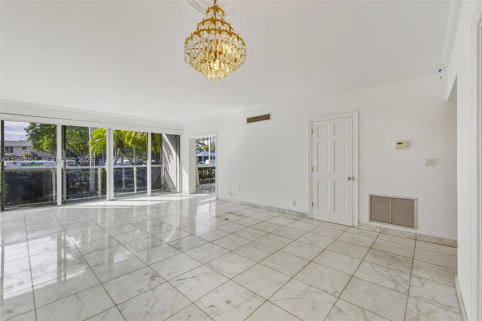 1 Harbour Way, Unit 108 Bal Harbour, FL 33154 - Photo 9 of 27 a view of an empty room and window