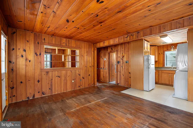 a kitchen with a sink and a microwave