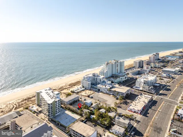 a aerial view of a house with a yard