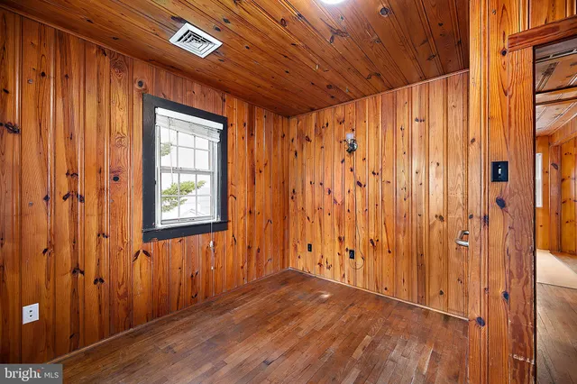 a bathroom with a toilet sink and shower