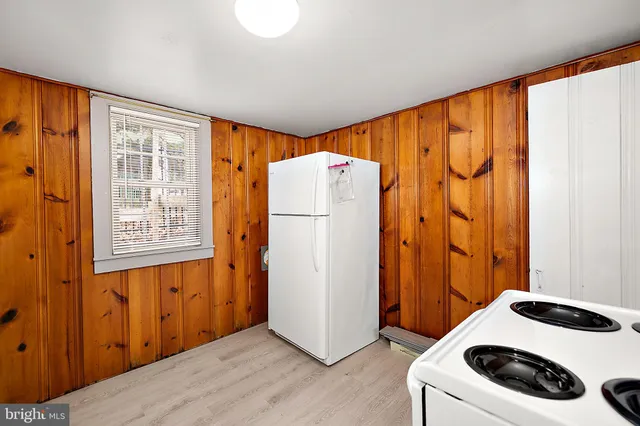 a view of a hallway with entryway