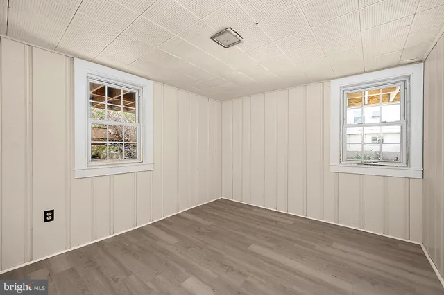 an aerial view of residential building and ocean