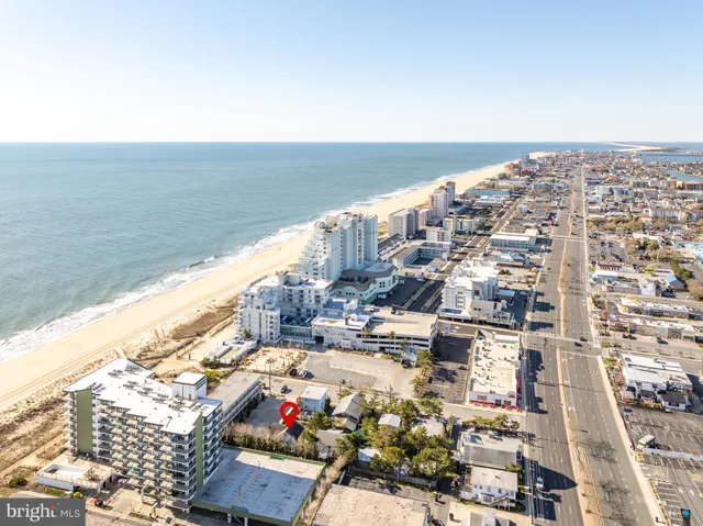 a view of a balcony with wooden floor