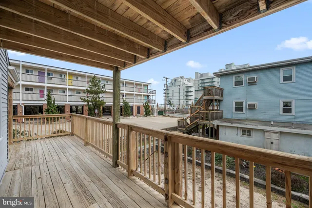 a view of a balcony with city view