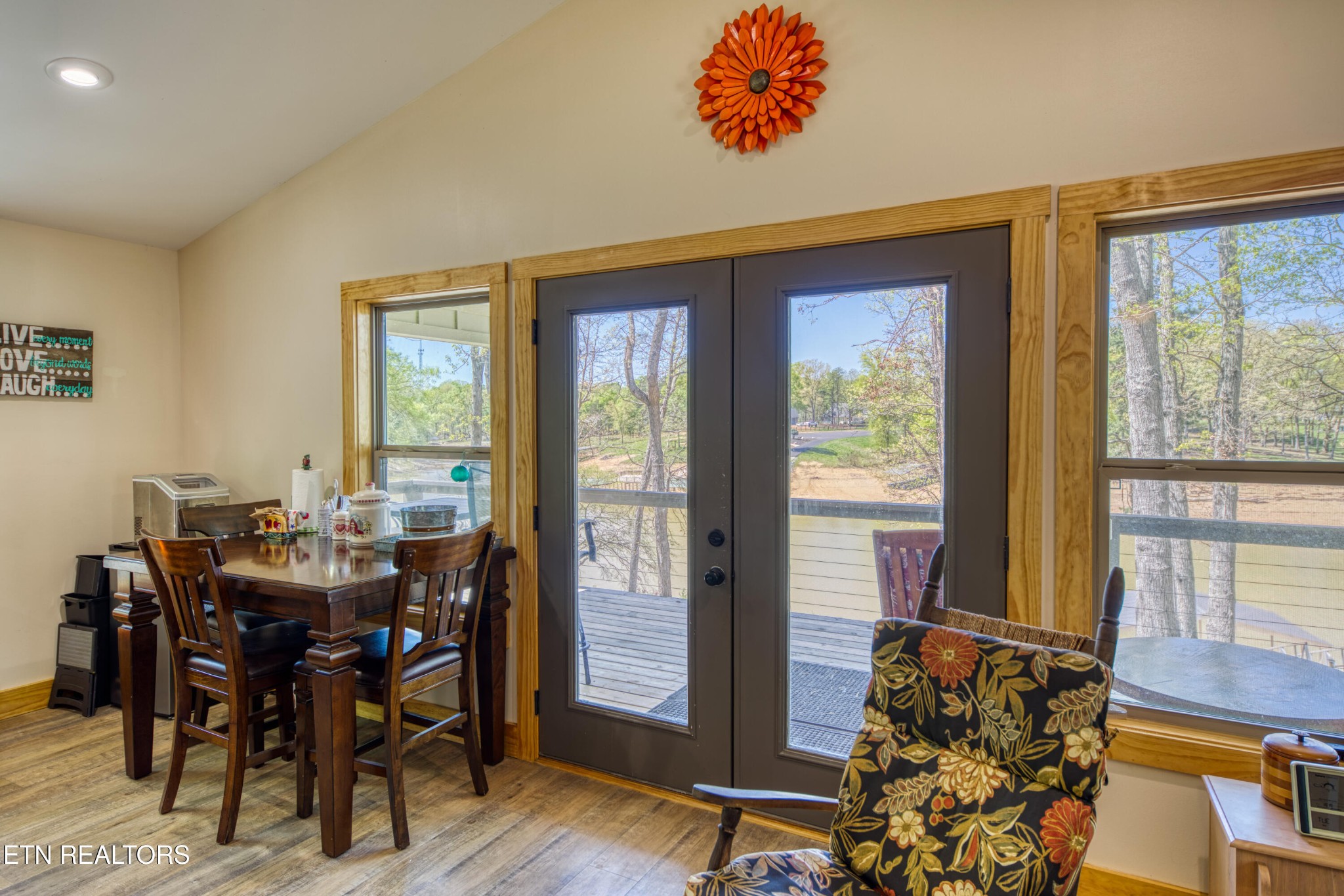 1040 Rdg Pt Trail Dandridge, TN 37725 - Photo 18 of 31 a view of a dining room with furniture window and wooden floor
