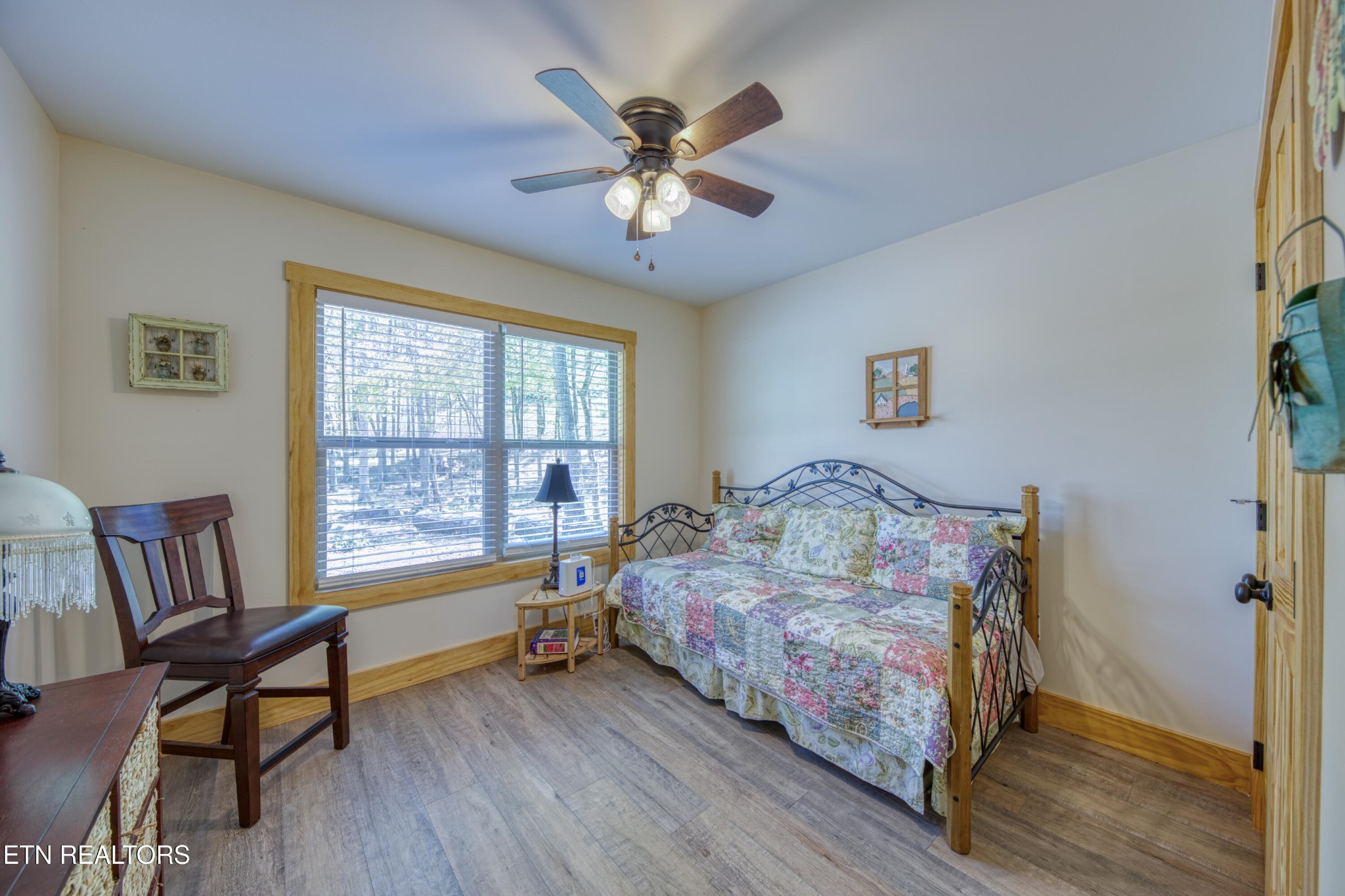 1040 Rdg Pt Trail Dandridge, TN 37725 - Photo 21 of 31 a bedroom with a bed and a table in it