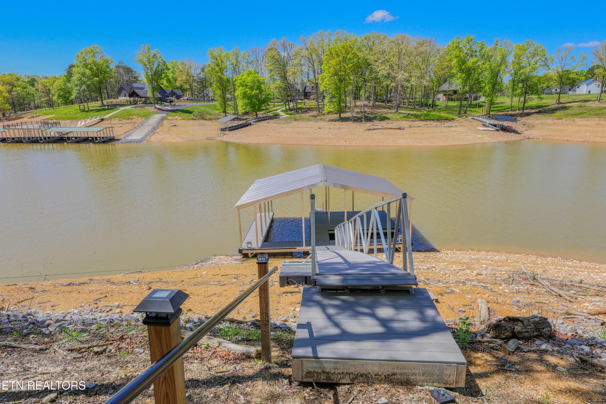 1040 Rdg Pt Trail Dandridge, TN 37725 - Photo 26 of 31 a view of a lake with a mountain