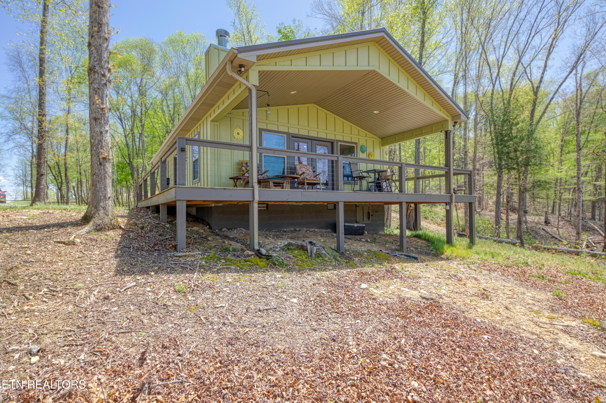 1040 Rdg Pt Trail Dandridge, TN 37725 - Photo 7 of 31 a view of a house with a yard and sitting area