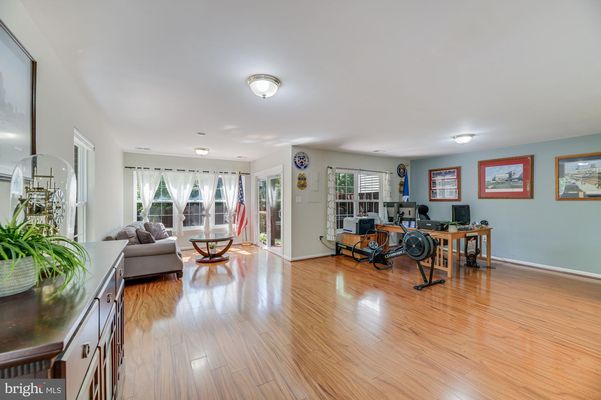 7265 John Rylands Way Springfield, VA 22150 - Photo 20 of 26 Lower level recreation room with sitting area