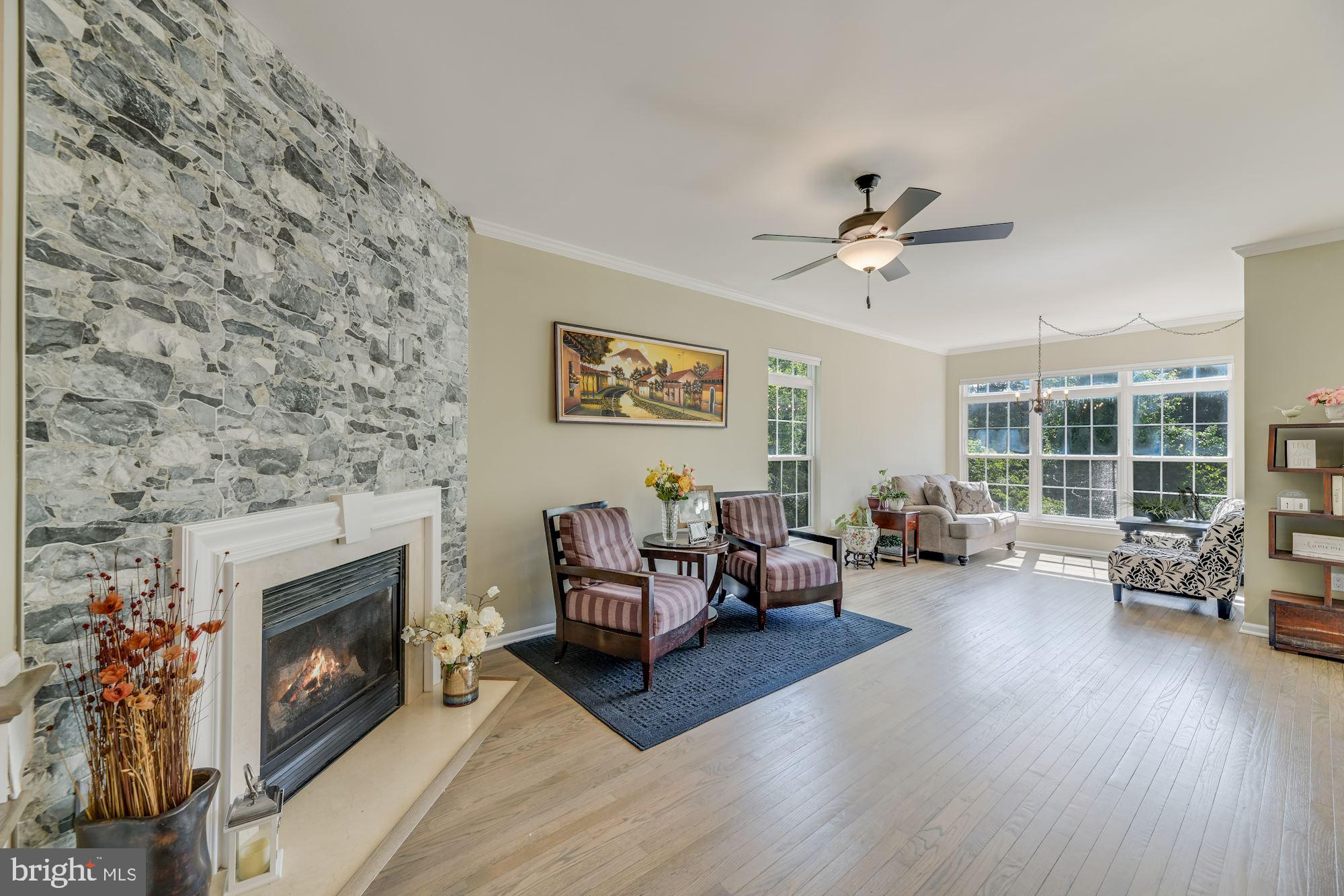 7265 John Rylands Way Springfield, VA 22150 - Photo 5 of 26 Family Room with fireplace