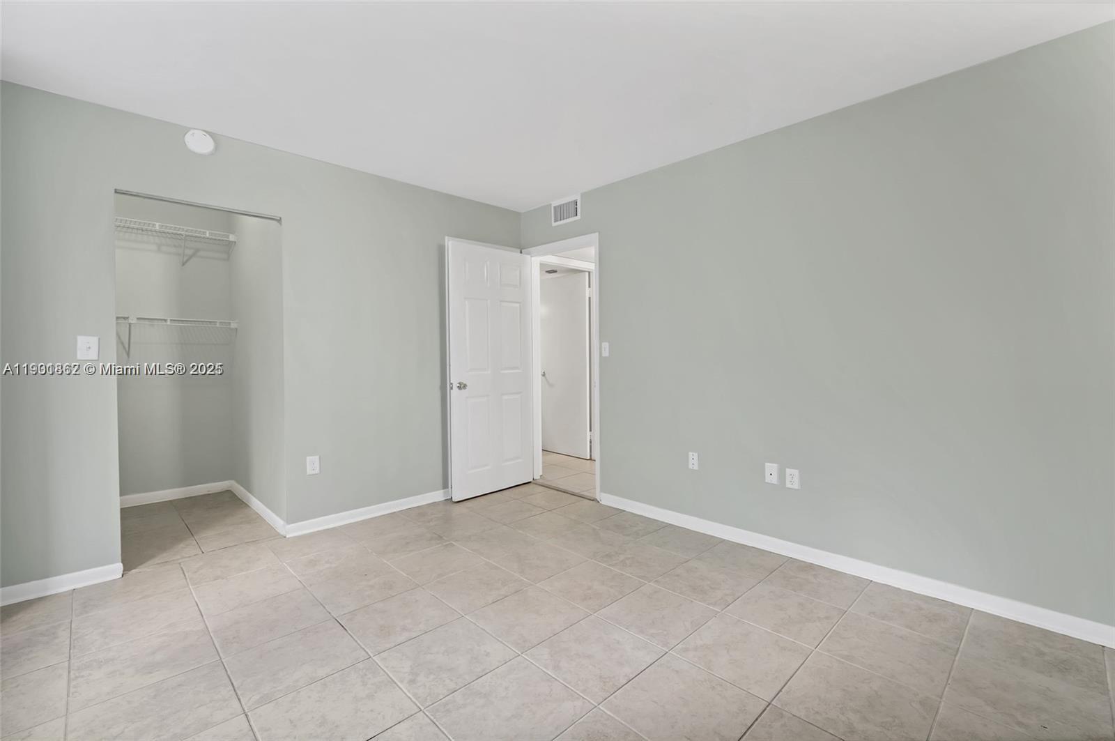 8335 Southwest 152nd Avenue, Unit B203 Miami, FL 33193 - Photo 5 of 10 a view of an empty room