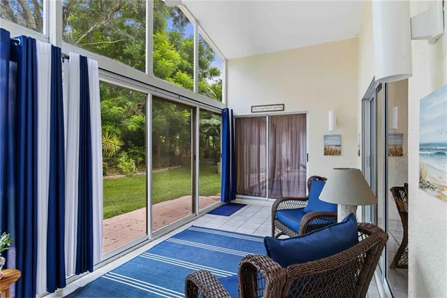 a big house with a big yard and large trees