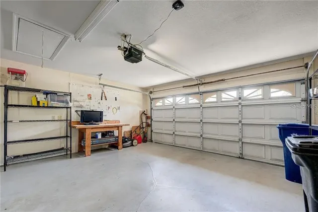 a kitchen with a sink stove and microwave