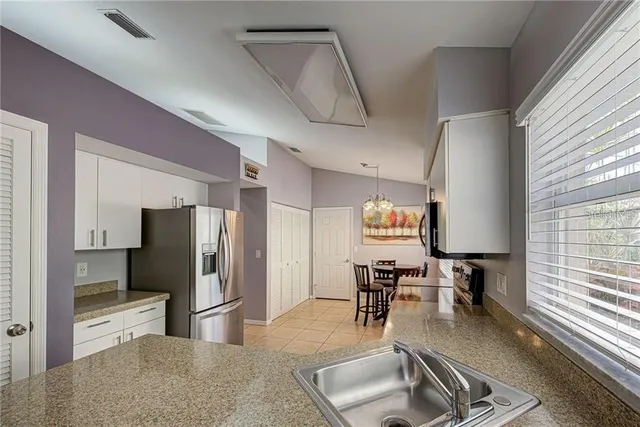 an empty room with wooden floor